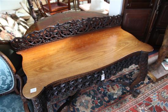 A 19th century Anglo-Indian padouk wood side table, W.4ft 4in. D.2ft H.3ft 2in.